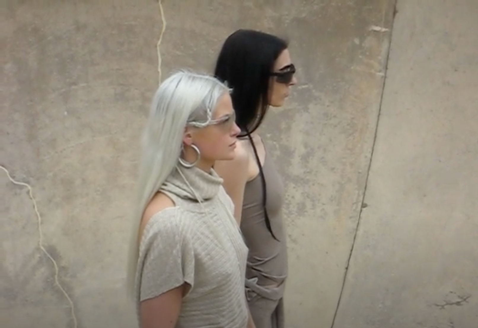 Load video: A video project by Greta Bell with styling by Savanna Wills, designer of the &quot;SWiLLS&quot; label. Features SWiLLS rattails, hairs 001 bag, and Dune knit sweater.